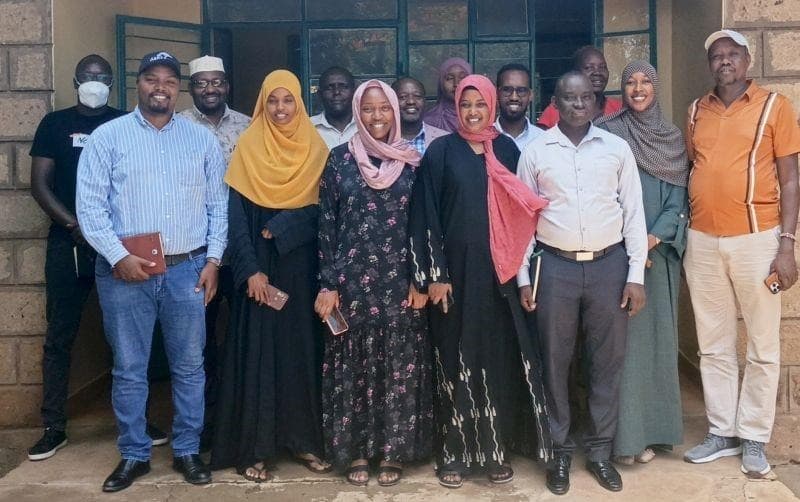 ASREP Africa community team group photo with programme staff and community partners in Isiolo County