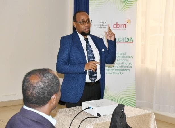 ASREP Africa Executive Director presenting programme findings and impact to an audience of stakeholders