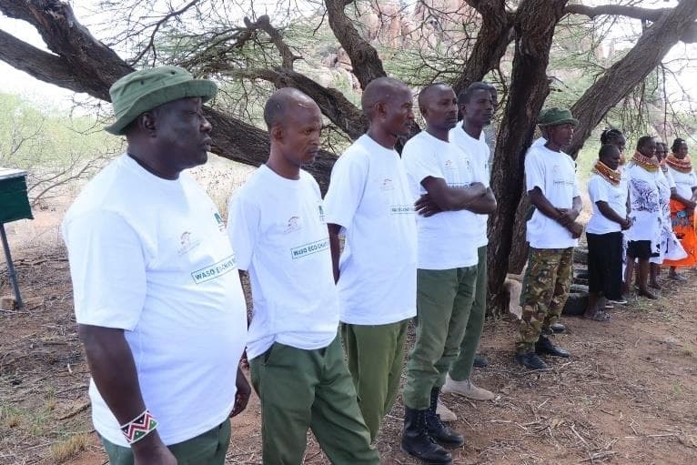 Waso Eco-Champions holding tree seedlings — your donation makes this possible